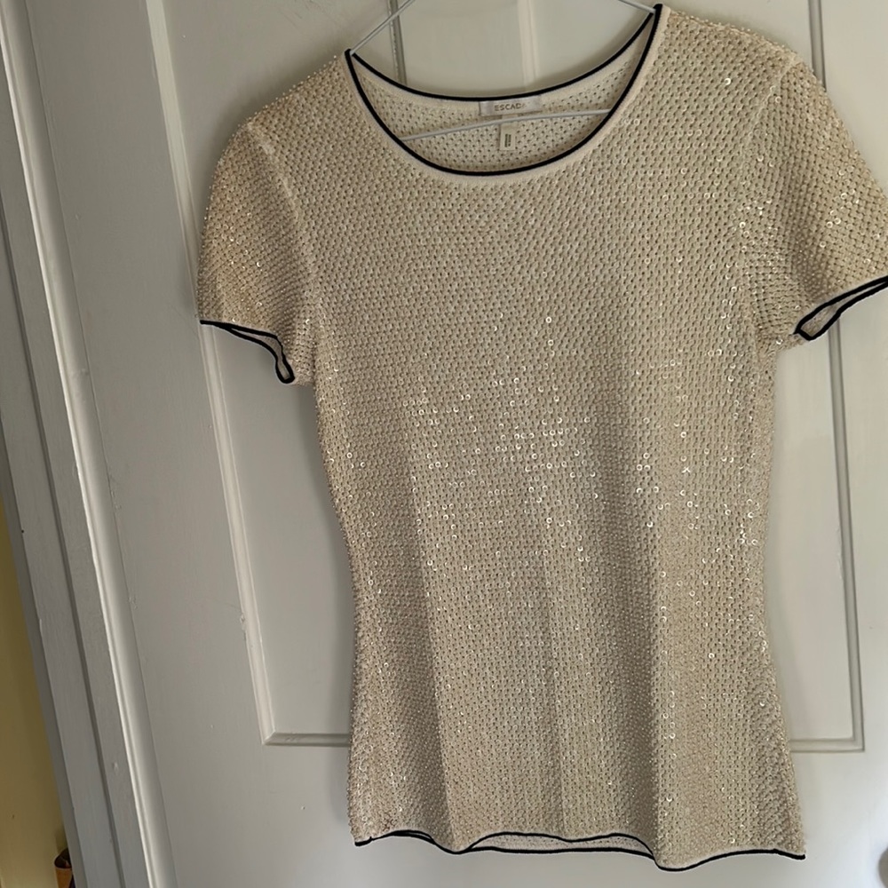 Stunning sequins for this pretty and classic evening top!